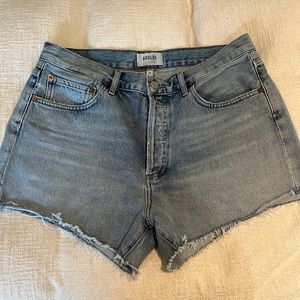 Agolde Parker mid rise denim shorts.